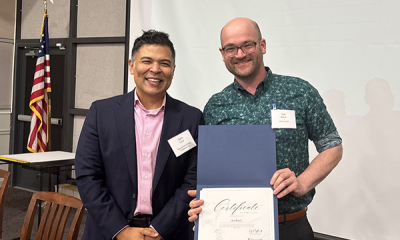 Completion certificate for LLNJ’s PM Fundamentals + AI Integration Bootcamp, presented by Sam Sena (left) to Jon Braun, LibraryLinkNJ