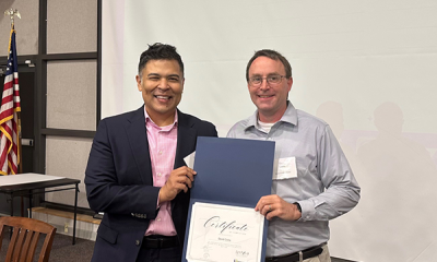 Completion certificate for LLNJ’s PM Fundamentals + AI Integration Bootcamp, presented by Sam Sena (left) to David Costa, Sparta Free Public Library