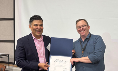 Completion certificate for LLNJ’s PM Fundamentals + AI Integration Bootcamp, presented by Sam Sena (left) to Andrew Eason, Monroe Township Public Library