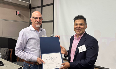 Completion certificate for LLNJ’s PM Fundamentals + AI Integration Bootcamp, presented by Sam Sena (right) to Kurt Hadeler, Mahwah Free Public Library