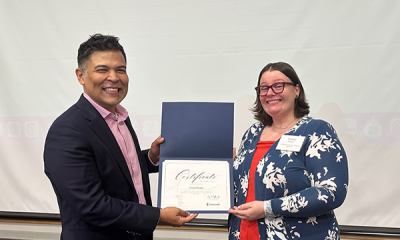 Completion certificate for LLNJ’s PM Fundamentals + AI Integration Bootcamp, presented by Sam Sena (left) to Crystal Hooper, Somerset County Library System