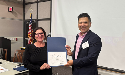 Completion certificate for LLNJ’s PM Fundamentals + AI Integration Bootcamp, presented by Sam Sena (right) to Leah Kloc, Sayreville Free Public Library