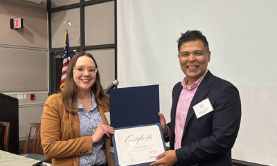 Completion certificate for LLNJ’s PM Fundamentals + AI Integration Bootcamp, presented by Sam Sena (right) to Andrea Levandowski, New Jersey State Library