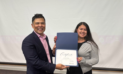 Completion certificate for LLNJ’s PM Fundamentals + AI Integration Bootcamp, presented by Sam Sena (left) to Lisa Palacio Morales, Roselle Park Veterans Memorial Library